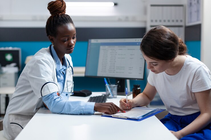 woman-patient-signing-medical-documents-discussing-medication-treatment_482257-23033 woman-patient-signing-medical-documents-discussing-medication-treatment_482257-23033