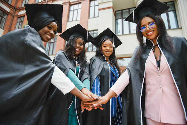 young-graduates-standing-front-university-building-graduation-day_255667-14824 young-graduates-standing-front-university-building-graduation-day_255667-14824